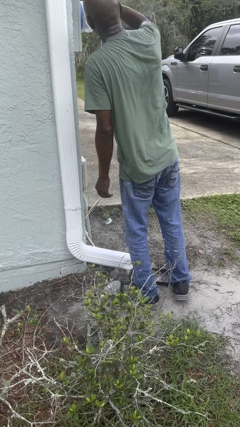 Checking the exterior of a Brevard County home
